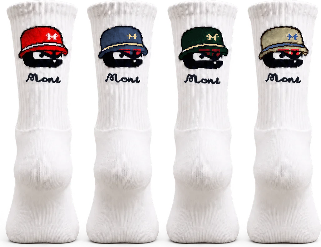 Four long MONS socks shown from the rear with full cuff logos, ordered red, blue, green and beige